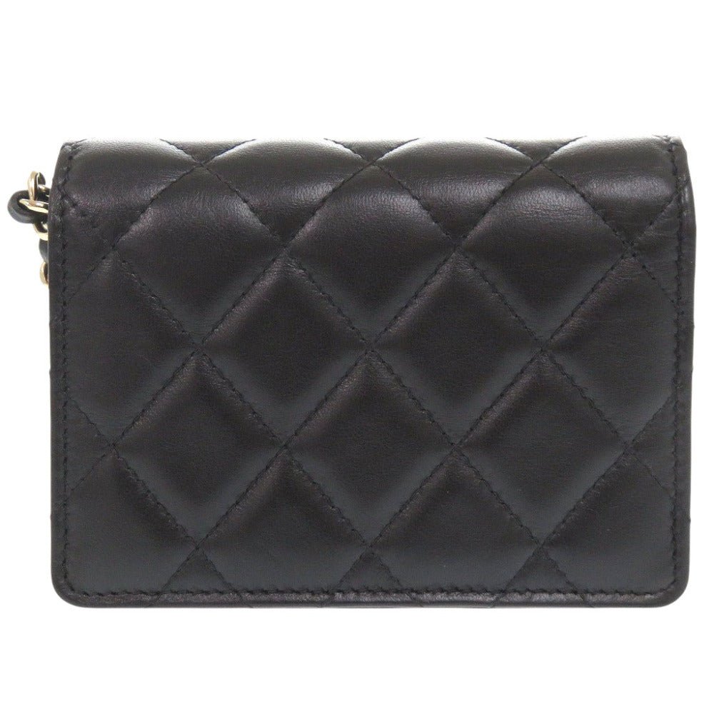 CHANEL Camellia COCO Mark Chain Wallet in Black Matelassé Lambskin with Ribbon Detail – Designed by Karl Lagerfeld, Item No. 6L0943IEA6m10 2010s, 100% Authentic Pre - Owned - LLUXE.CA