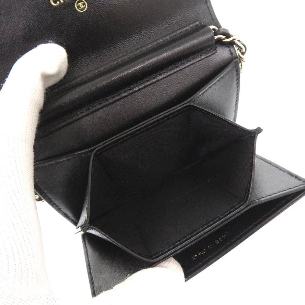 CHANEL Camellia COCO Mark Chain Wallet in Black Matelassé Lambskin with Ribbon Detail – Designed by Karl Lagerfeld, Item No. 6L0943IEA6m10 2010s, 100% Authentic Pre - Owned - LLUXE.CA
