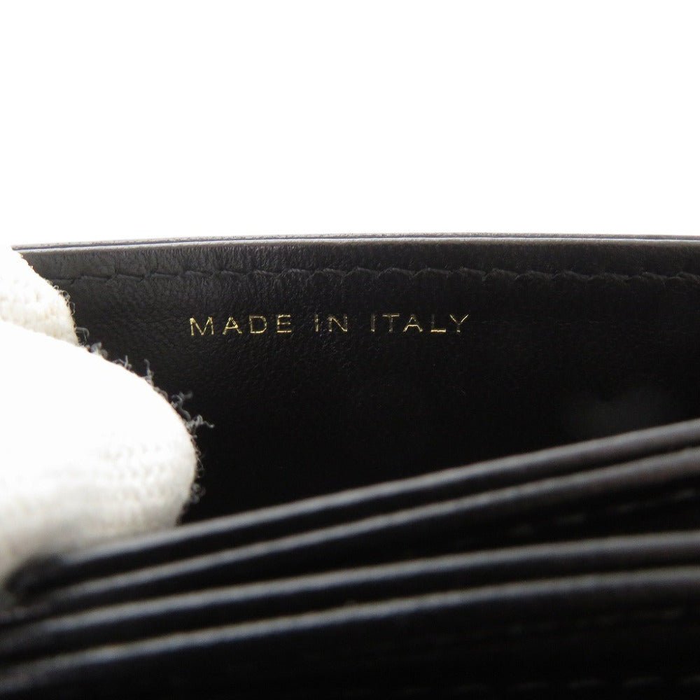 CHANEL Camellia COCO Mark Chain Wallet in Black Matelassé Lambskin with Ribbon Detail – Designed by Karl Lagerfeld, Item No. 6L0943IEA6m10 2010s, 100% Authentic Pre - Owned - LLUXE.CA