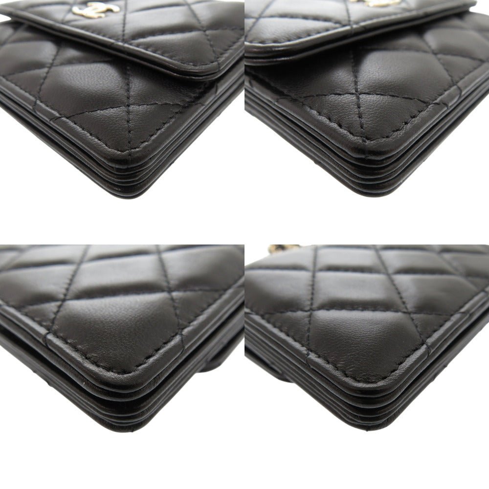 CHANEL Camellia COCO Mark Chain Wallet in Black Matelassé Lambskin with Ribbon Detail – Designed by Karl Lagerfeld, Item No. 6L0943IEA6m10 2010s, 100% Authentic Pre - Owned - LLUXE.CA