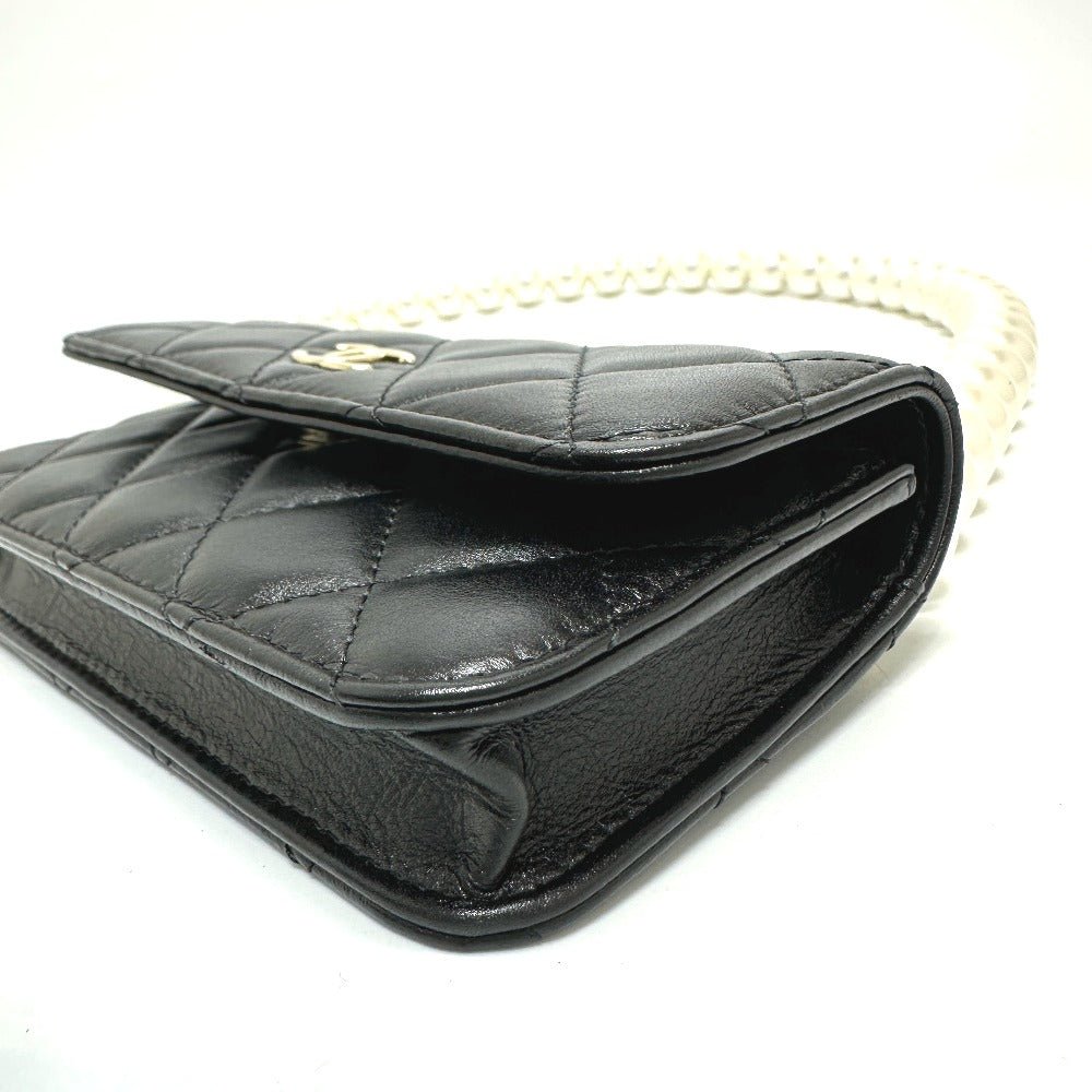 CHANEL Pearl Shoulder Mini Bag in Black Lambskin – CC COCO Mark, Item No. G - 231225 - 109 Designed by Karl Lagerfeld, Early 2010s, 100% Authentic Pre - Owned Like new / excellent condition - LLUXE.CA