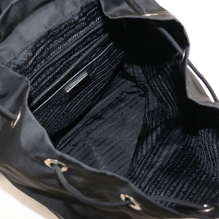 PRADA – Nylon Backpack – Model No. PR89900 – Miuccia Prada – 1984 (Reissue) – 100% Authentic Pre - Owned Item No:usdpr89900011 - LLUXE.CA