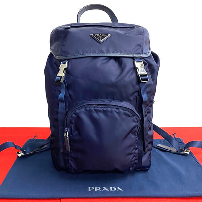 PRADA Triangle Logo Metal –– Navy – 100% Authentic Pre-Owned