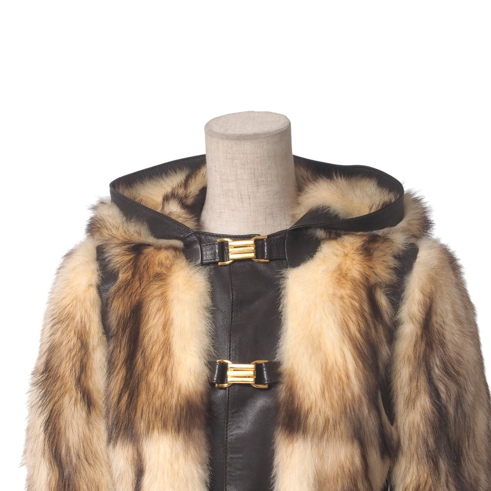 Dolce & Gabbana hooded jacket of brown leather and polecat fur, with goldtone logo buckle closures Size 38 –