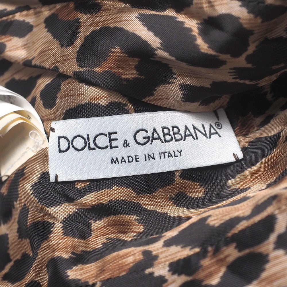 Dolce & Gabbana hooded jacket of brown leather and polecat fur, with goldtone logo buckle closures Size 38 –