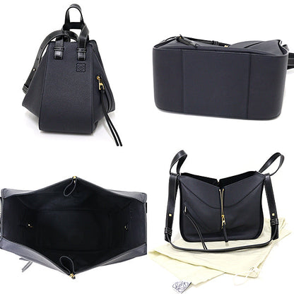 LOEWE Navy Hammock Small 2WAY Navy 100% Authentic Pre-Owned
Designer/Year: Jonathan Anderson – Introduced 2016 Ongoing Collection    A Rank ✨ Excellent