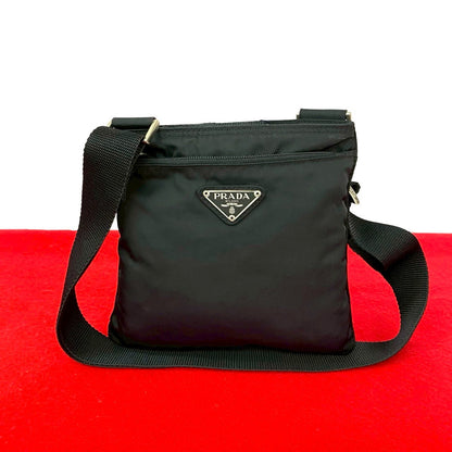 Prada               Triangle Logo       100% Authentic ✨Very Good Pre-Owned Condition ~27 % MSRP