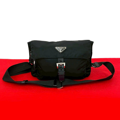 Prada               Triangle Logo        100% Authentic      Pre-Owned          ✨Very Good Pre Owned Condition ~26% MSRP