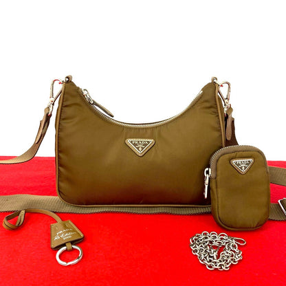 Prada               Triangle Logo Nylon & Leather 100% Authentic ✨Very Good Pre-Owned Condition            ~30% MSRP