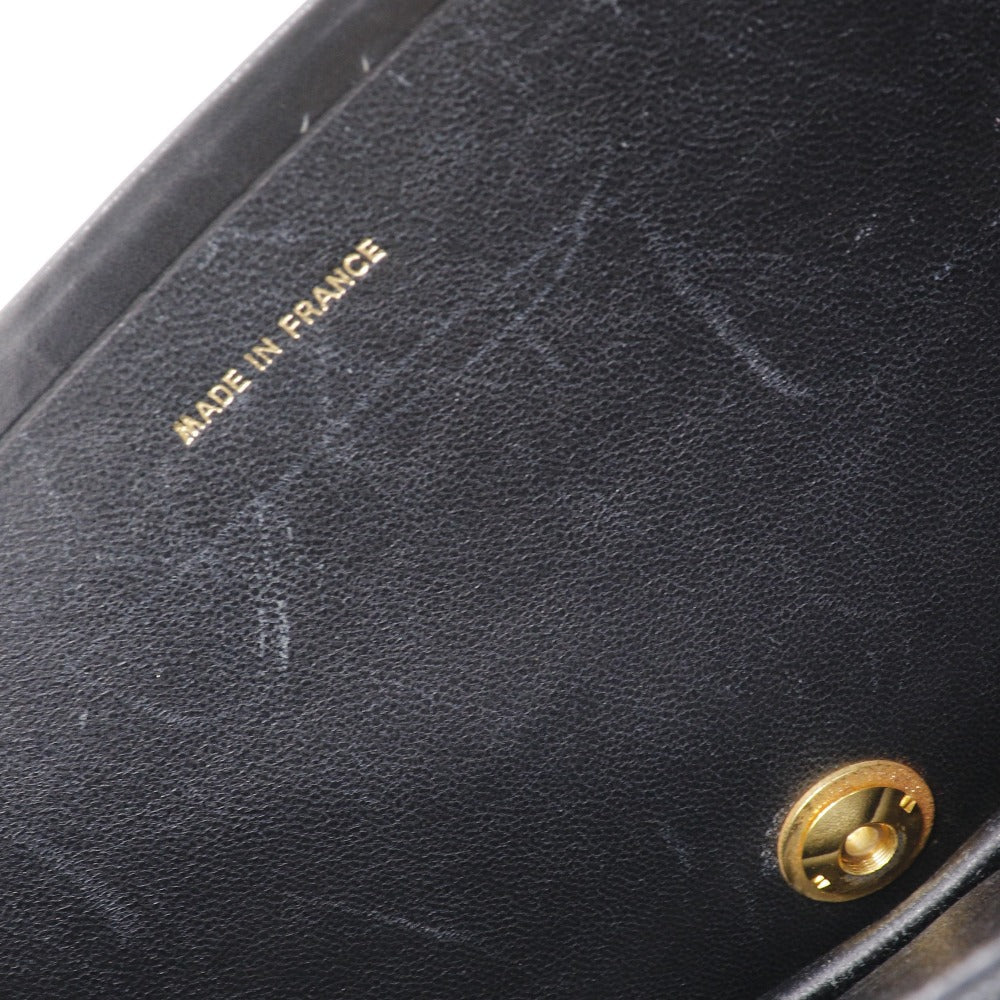 CHANEL vintage Chain Shoulder bag in black calfskin with classic COCO Mark harware Vintage