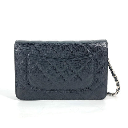 CHANEL  Chain Wallet in Black Quilted Caviar Leather –	Designed by Karl Lagerfeld, 2010s, 100% Authentic Pre-Owned