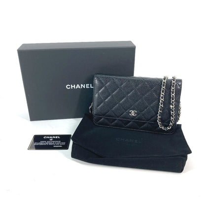 CHANEL  Chain Wallet in Black Quilted Caviar Leather –	Designed by Karl Lagerfeld, 2010s, 100% Authentic Pre-Owned
