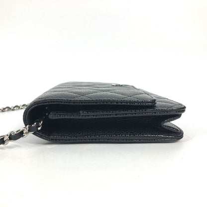 CHANEL  Chain Wallet in Black Quilted Caviar Leather –	Designed by Karl Lagerfeld, 2010s, 100% Authentic Pre-Owned
