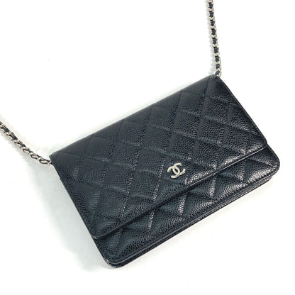 CHANEL  Chain Wallet in Black Quilted Caviar Leather –	Designed by Karl Lagerfeld, 2010s, 100% Authentic Pre-Owned