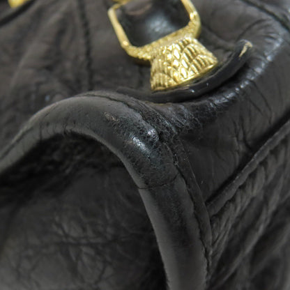 Balenciaga 00024768 by Nicolas Ghesquière – Giant Mini City Bag, 2WAY Style, Black Leather with Giant Gold Hardware, 2010s Collection, 100% Authentic Pre - Owned Item No. 75514657 - LLUXE.CA