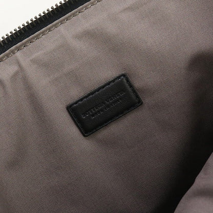 BOTTEGA VENETA – INTRECCIATO Clutch Bag – Black Leather – Tomas Maier – Circa 2016 – 100% Authentic Pre - Owned - LLUXE.CA