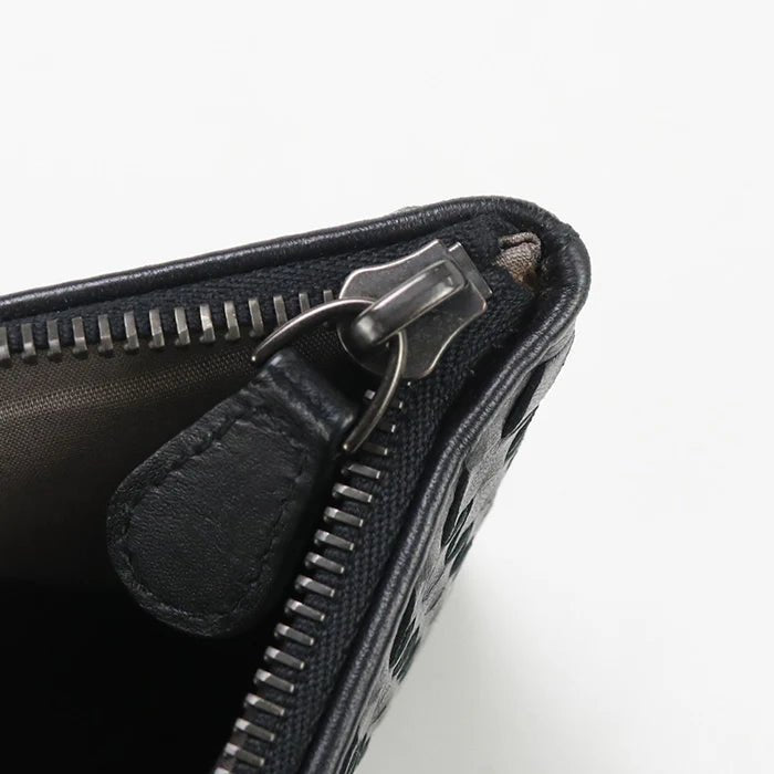 BOTTEGA VENETA – INTRECCIATO Clutch Bag – Black Leather – Tomas Maier – Circa 2016 – 100% Authentic Pre - Owned - LLUXE.CA