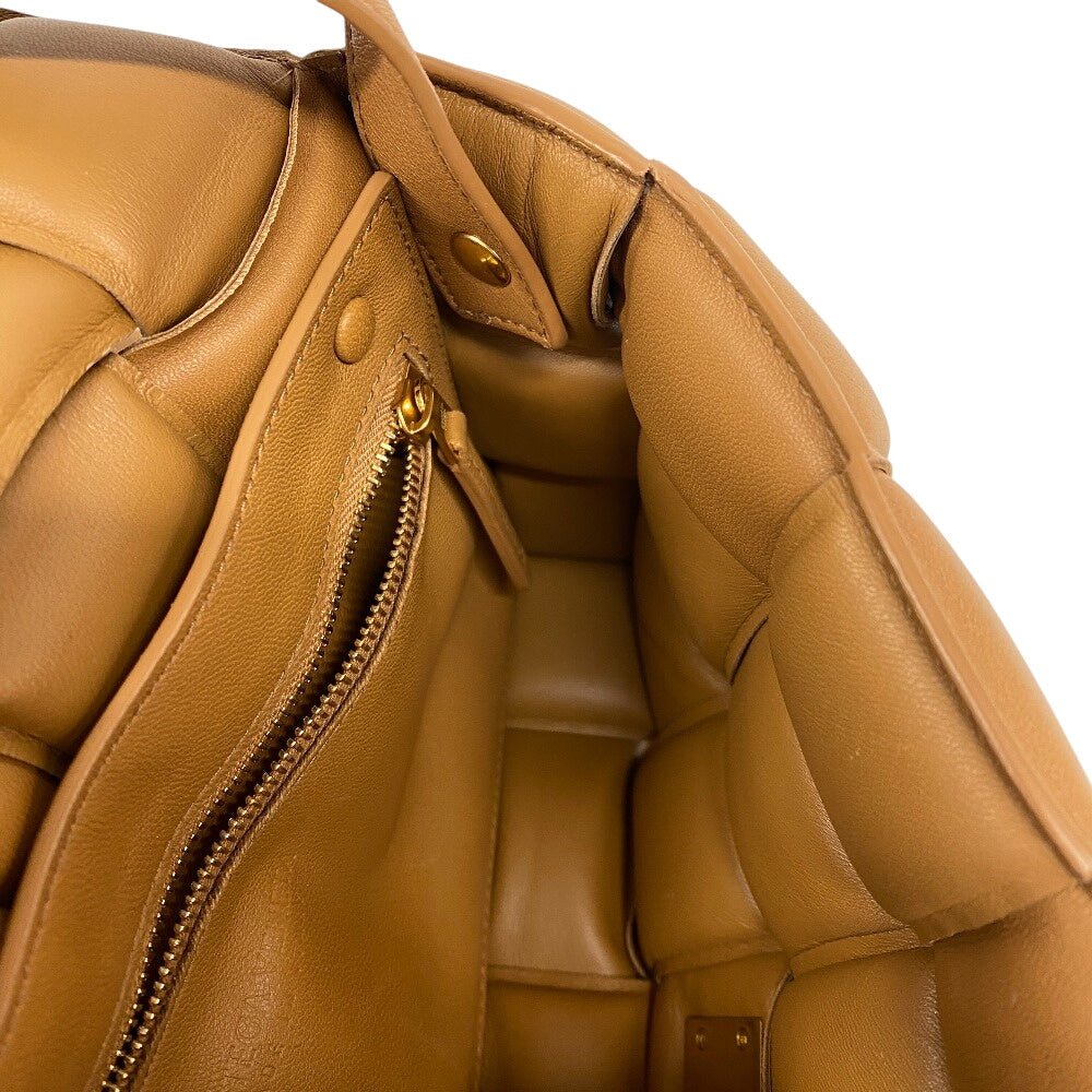 Bottega Veneta Padded Cassette Maxi Intrecciato item No. Z0009509 in Caramel Leather – Designed by Daniel Lee, 2019 Collection, Made in Italy – Pre - Owned, 100% Authentic (Genuine) - LLUXE.CA