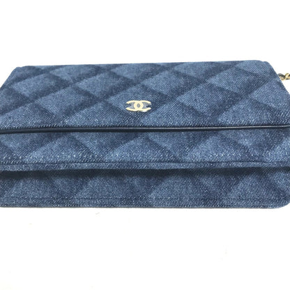 CHANEL AP0250 Long Wallet on Chain in Denim Blue Matelassé – Quilted ,Designed by Karl Lagerfeld, 2020s, 100% Authentic Pre - Owned item No. 30860 - 22790 - 1 Never used / store - fresh see - LLUXE.CA