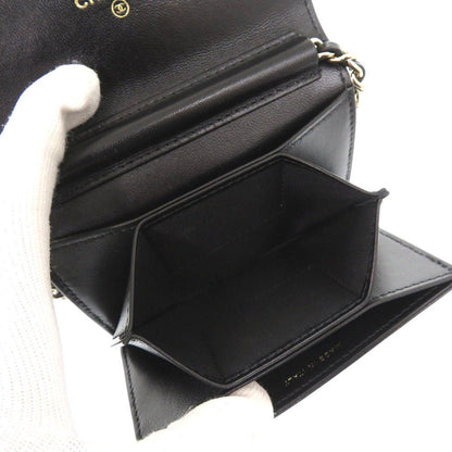 CHANEL Camellia COCO Mark Chain Wallet in Black Matelassé Lambskin with Ribbon Detail – Designed by Karl Lagerfeld, Item No. 6L0943IEA6m10 2010s, 100% Authentic Pre - Owned - LLUXE.CA
