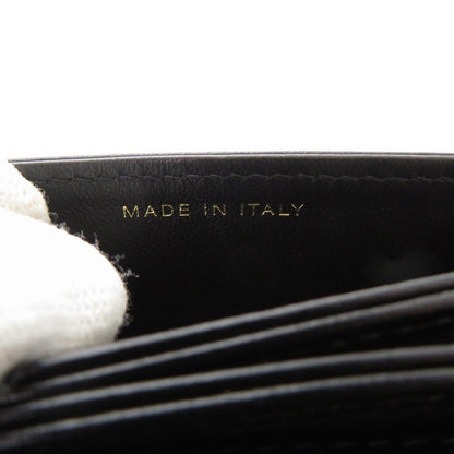 CHANEL Camellia COCO Mark Chain Wallet in Black Matelassé Lambskin with Ribbon Detail – Designed by Karl Lagerfeld, Item No. 6L0943IEA6m10 2010s, 100% Authentic Pre - Owned - LLUXE.CA