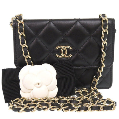 CHANEL Camellia COCO Mark Chain Wallet in Black Matelassé Lambskin with Ribbon Detail – Designed by Karl Lagerfeld, Item No. 6L0943IEA6m10 2010s, 100% Authentic Pre - Owned - LLUXE.CA