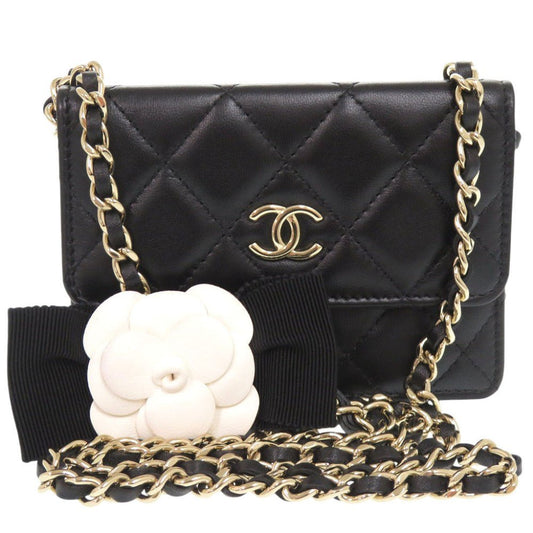 CHANEL Camellia COCO Mark Chain Wallet in Black Matelassé Lambskin with Ribbon Detail – Designed by Karl Lagerfeld, Item No. 6L0943IEA6m10 2010s, 100% Authentic Pre - Owned - LLUXE.CA