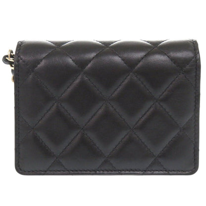 CHANEL Camellia COCO Mark Chain Wallet in Black Matelassé Lambskin with Ribbon Detail – Designed by Karl Lagerfeld, Item No. 6L0943IEA6m10 2010s, 100% Authentic Pre - Owned - LLUXE.CA