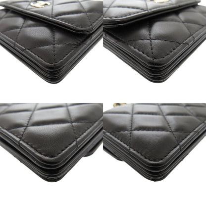 CHANEL Camellia COCO Mark Chain Wallet in Black Matelassé Lambskin with Ribbon Detail – Designed by Karl Lagerfeld, Item No. 6L0943IEA6m10 2010s, 100% Authentic Pre - Owned - LLUXE.CA