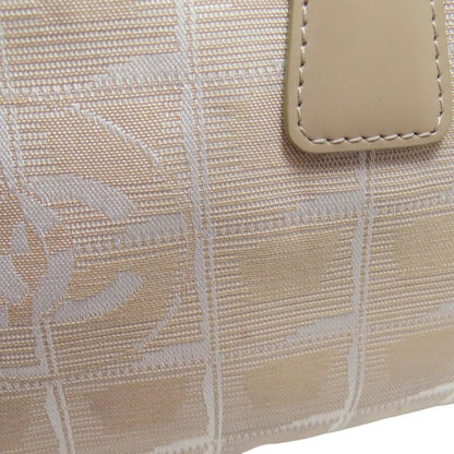 CHANEL – New Travel Line Handbag – Beige Nylon Jacquard – Karl Lagerfeld – 1999 – 100% Authentic Pre - Owned - LLUXE.CA
