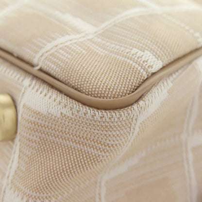 CHANEL – New Travel Line Handbag – Beige Nylon Jacquard – Karl Lagerfeld – 1999 – 100% Authentic Pre - Owned - LLUXE.CA