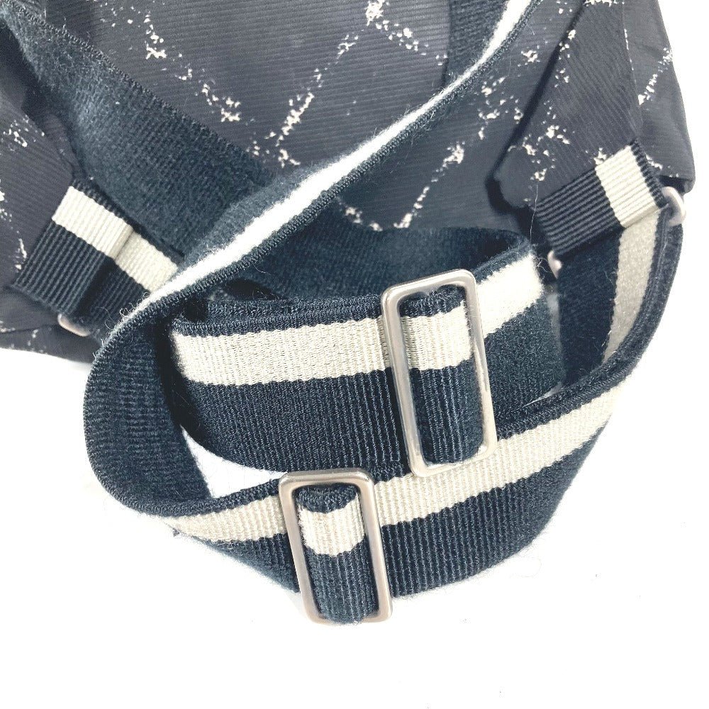 CHANEL Old Travel Line Backpack wMN - 241222 - 13 in Black Nylon – From the Ligne de Voyage Collection by Karl Lagerfeld (Circa Early 2000s) – Pre - Owned in Excellent Condition, 100% Authentic - LLUXE.CA