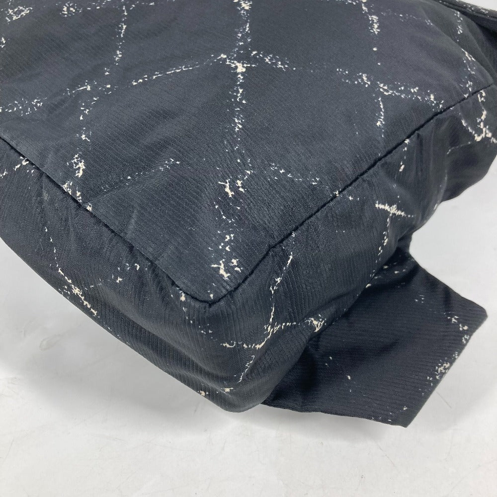 CHANEL Old Travel Line Backpack wMN - 241222 - 13 in Black Nylon – From the Ligne de Voyage Collection by Karl Lagerfeld (Circa Early 2000s) – Pre - Owned in Excellent Condition, 100% Authentic - LLUXE.CA