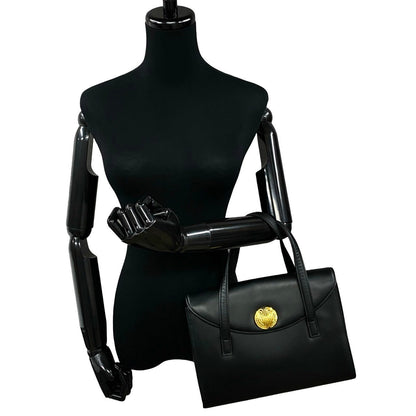 GIVENCHY Vintage Black Leather Handbag with Gold Medallion Logo (Circa 1980s–1990s, Designer: Hubert de Givenchy) – Pre - Owned, 100% Authentic - LLUXE.CA