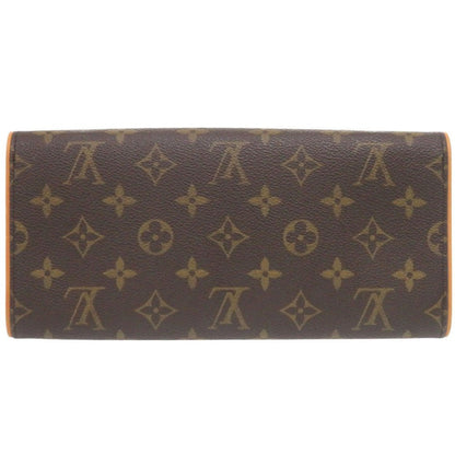 Louis Vuitton Pochette Twin GM 7D0331SP5k1 in Monogram Canvas (Vintage, Circa Late lol 1990s–Early 2000s) – Pre - Owned, 100% Authentic (Genuine) Item No.: 7D0331SP5k1 - LLUXE.CA