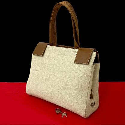 PRADA – Handbag – Triangle Logo Metal – Serial No. 99 – 100% Authentic Pre - Owned 2025 PRADA by Miuccia Prada 100% Authentic (Genuine) Item No. 662b254930327 - LLUXE.CA