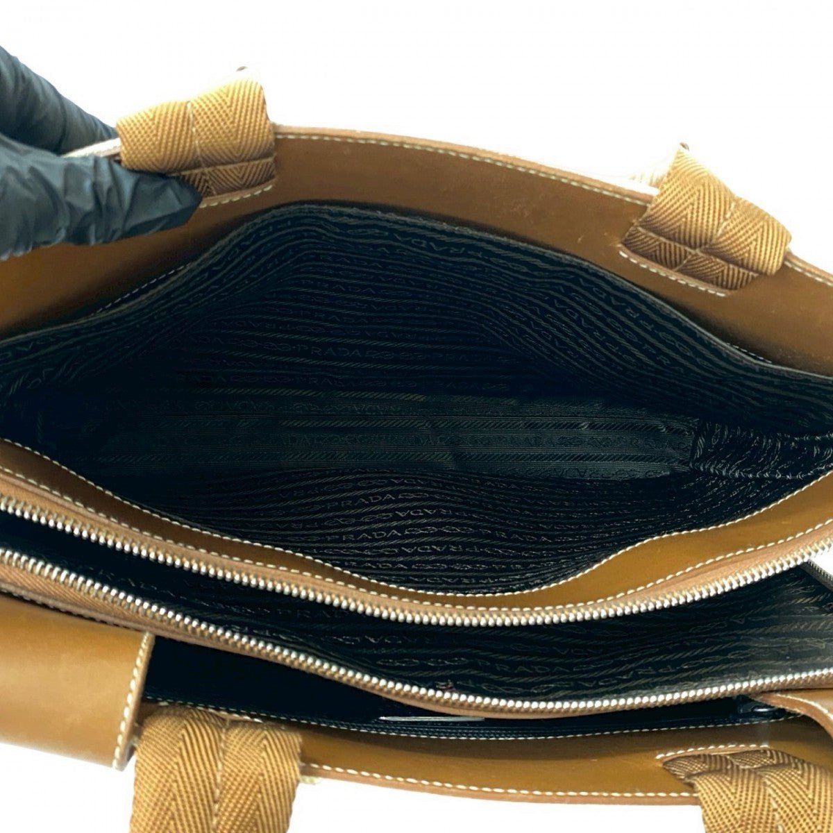 PRADA – Handbag – Triangle Logo Metal – Serial No. 99 – 100% Authentic Pre - Owned 2025 PRADA by Miuccia Prada 100% Authentic (Genuine) Item No. 662b254930327 - LLUXE.CA