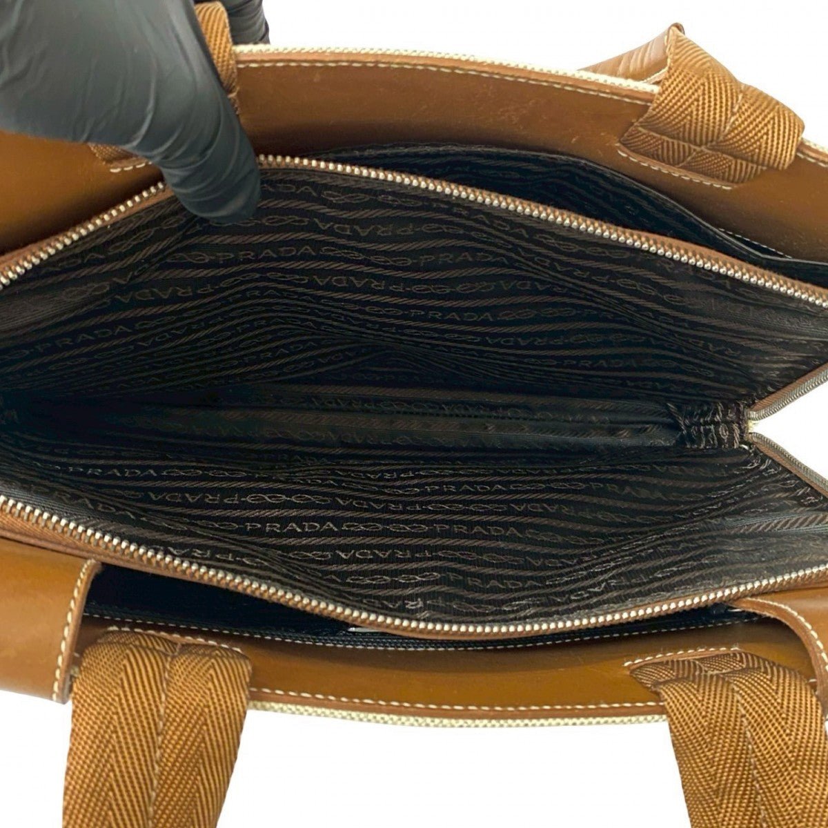 PRADA – Handbag – Triangle Logo Metal – Serial No. 99 – 100% Authentic Pre - Owned 2025 PRADA by Miuccia Prada 100% Authentic (Genuine) Item No. 662b254930327 - LLUXE.CA