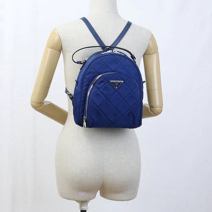 PRADA – – Mini Daypack – Backpack 1BZ066 Designed by Miuccia Prada – 2010s – 100% Authentic Pre - Owned Item No.: usdpr86616011 - LLUXE.CA