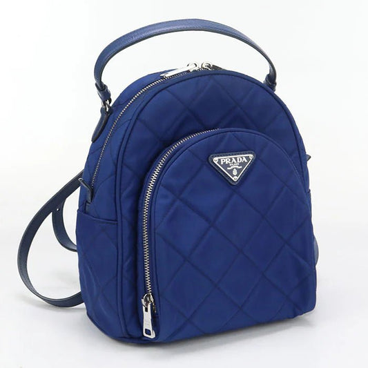 PRADA – – Mini Daypack – Backpack 1BZ066 Designed by Miuccia Prada – 2010s – 100% Authentic Pre - Owned Item No.: usdpr86616011 - LLUXE.CA