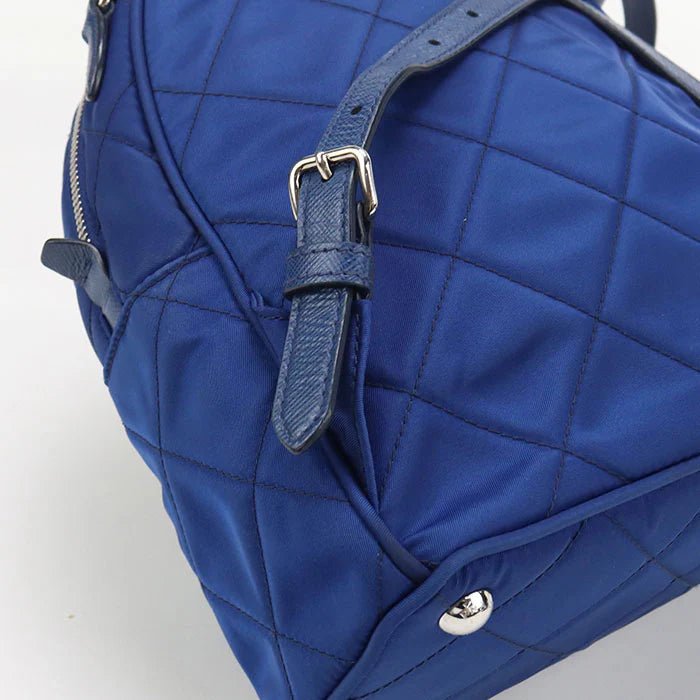 PRADA – – Mini Daypack – Backpack 1BZ066 Designed by Miuccia Prada – 2010s – 100% Authentic Pre - Owned Item No.: usdpr86616011 - LLUXE.CA