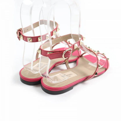 VALENTINO GARAVANI – Rockstud Flat Sandals – Pierpaolo Piccioli – 2019 – 100% Authentic Pre - Owned Near mint. Minimal signs of wear. Item No. 00033877 - LLUXE.CA