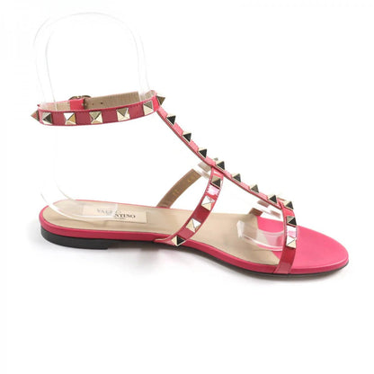 VALENTINO GARAVANI – Rockstud Flat Sandals – Pierpaolo Piccioli – 2019 – 100% Authentic Pre - Owned Near mint. Minimal signs of wear. Item No. 00033877 - LLUXE.CA